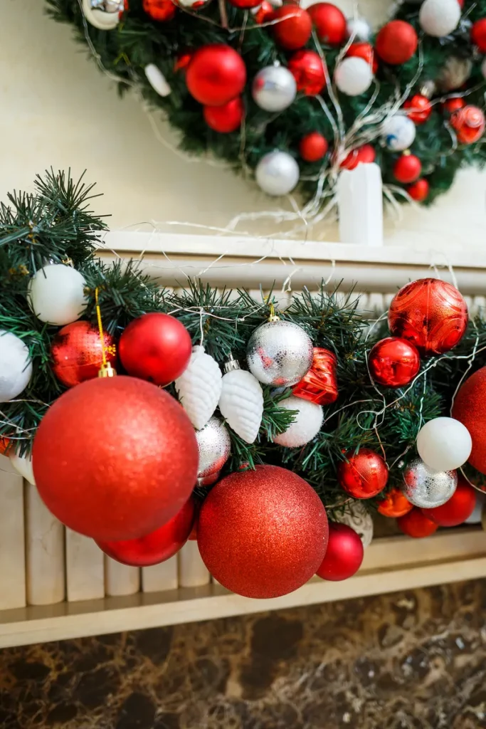 Some beautiful garlands decorated with red and silver ornaments.