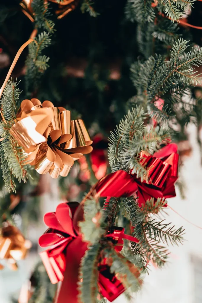 Some garland pew markers with ribbons.