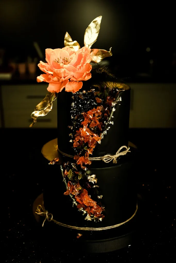 A dark and glamorous wedding cake.