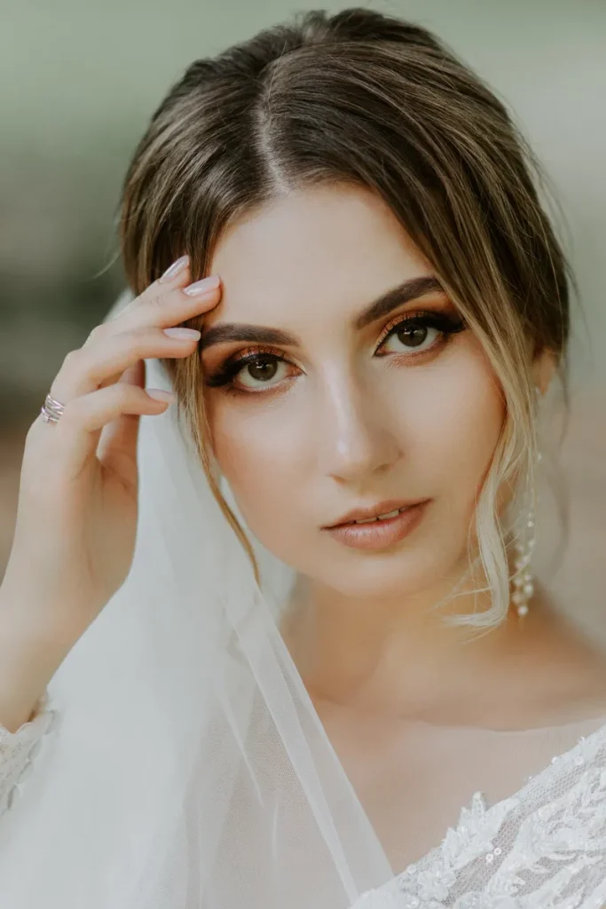 A soft glam makeup with lovely, effortless hair.