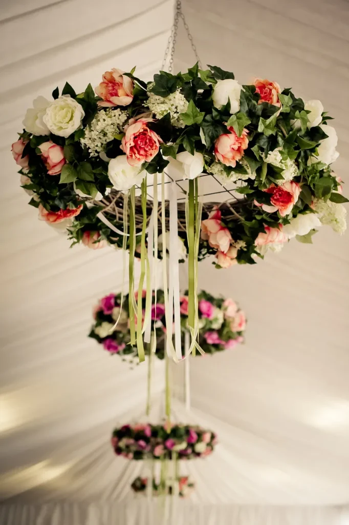 Circular flower chandeliers.