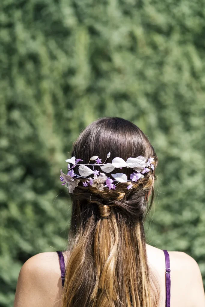 A beautiful Bohemian Wedding Hair look that's half up and half down, pulled away from the face that a bridesmaid could use.