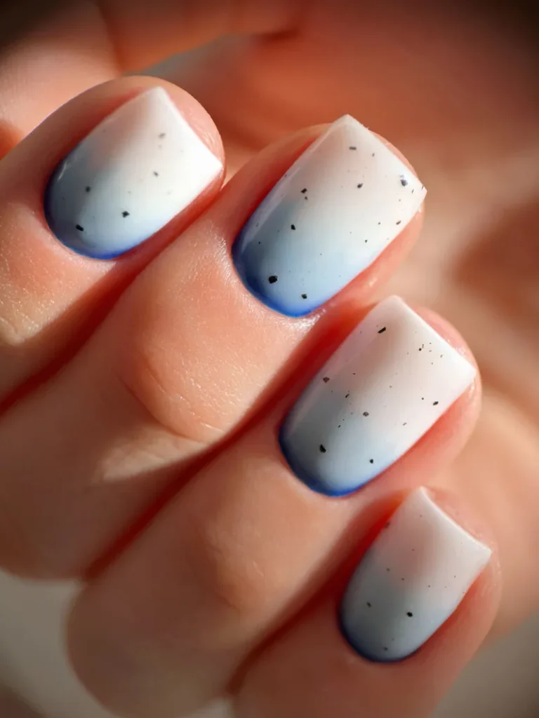 A soft blue ombre into a delicate white  nail makes for a very classy wedding nail look.
