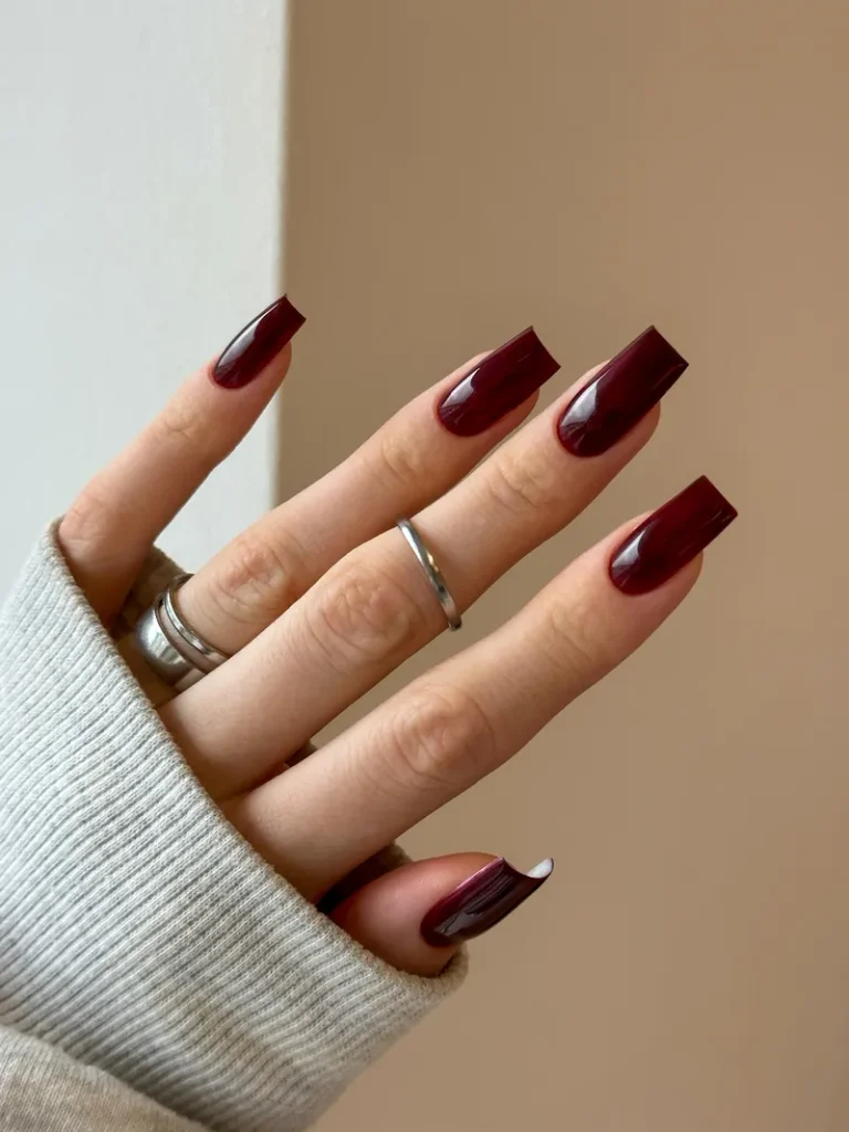 A picture of some sharp, square nails that feel particularly elegant and classy.