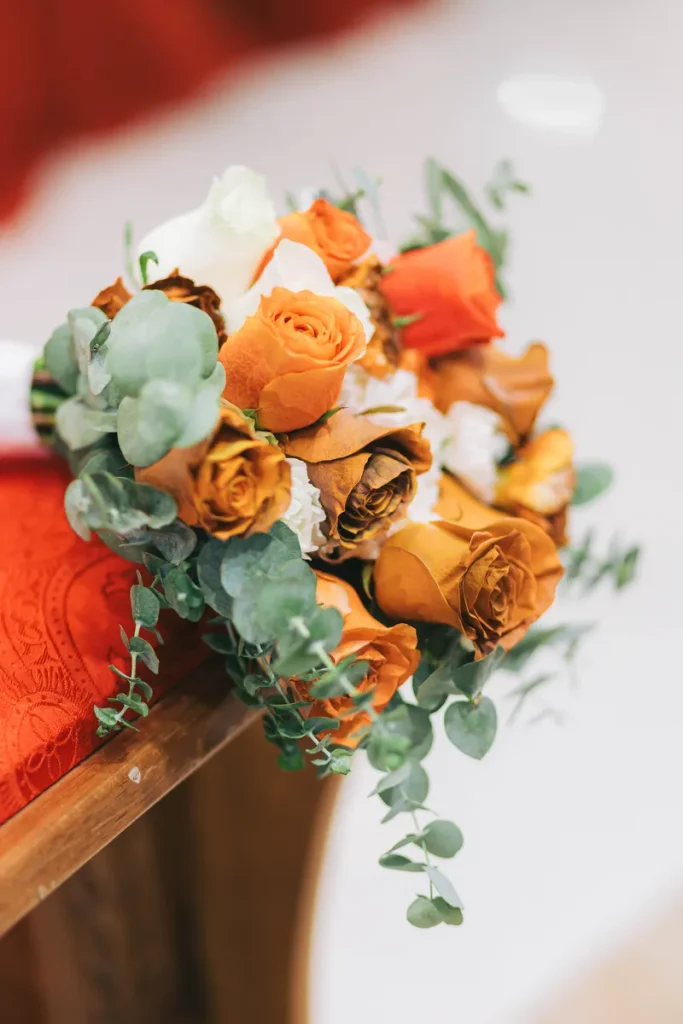 A simple bridal bouquet fall using similar colored roses to help keep a simple look.