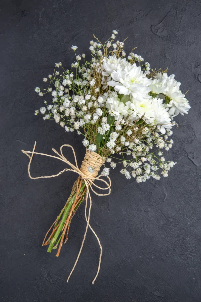 A white flower wedding bouquet that's perfect for a softer fall look.