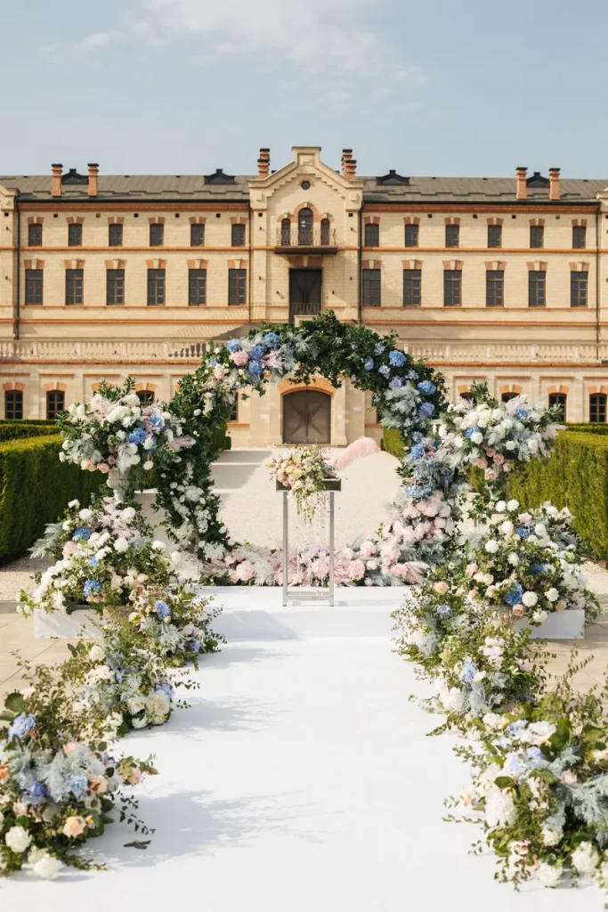 A beautiful historic inn with a ceremony setup in front of it.