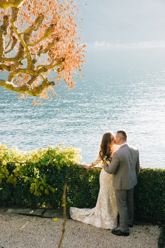 A couple enjoying their lakeside wedding.