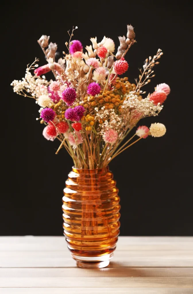 Amber Glass Bottle Wedding Centerpieces with dried flowers