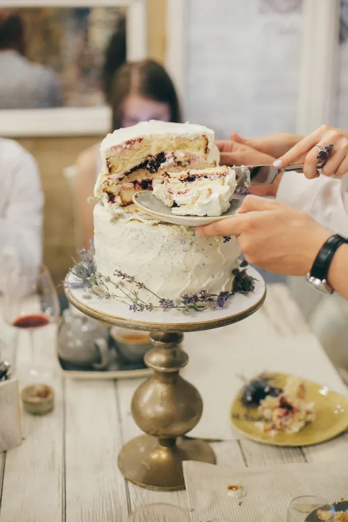 A lovely textured buttercream bohemian wedding cake with what looks like a jammy filling.