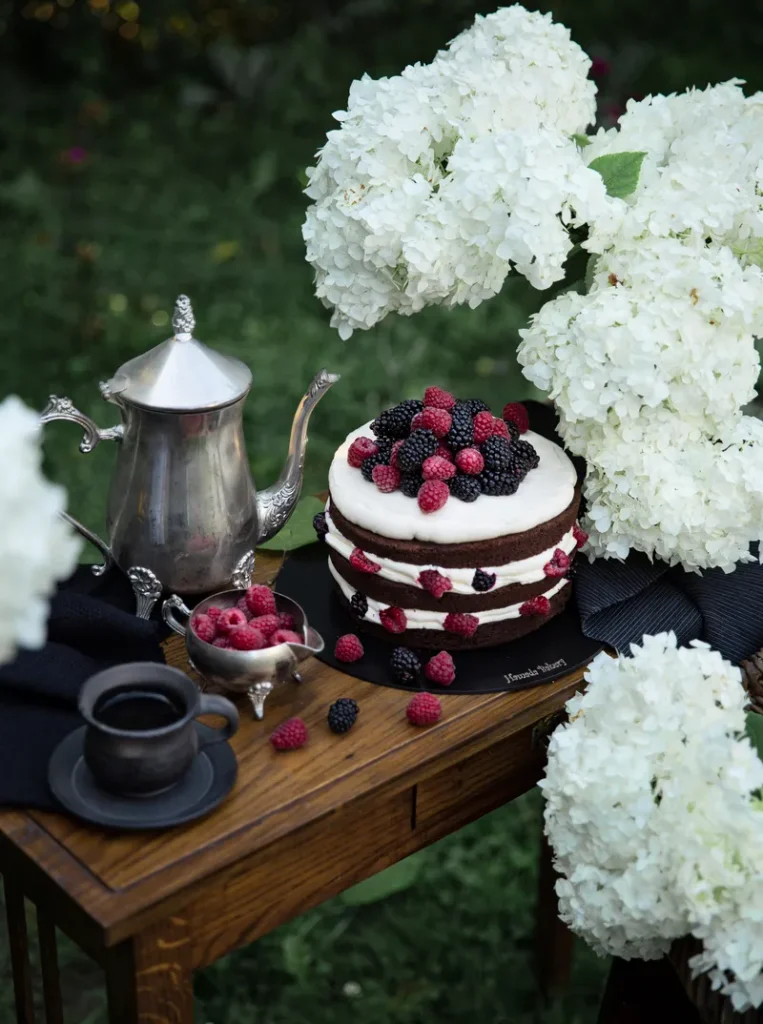 A moody fall wedding cake on a lovely set.