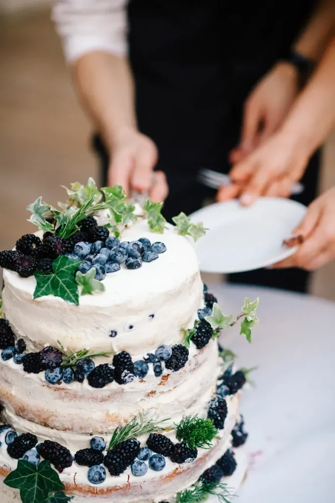 A woodland fall wedding cake with ivy and berries.
