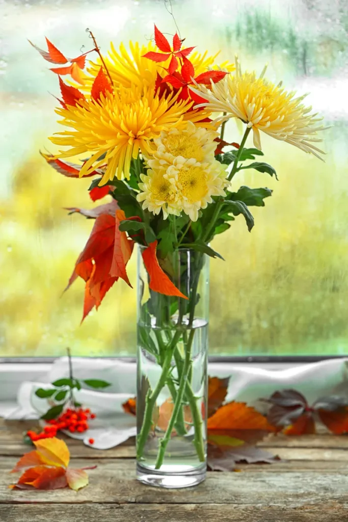 An example of how you could use some yellow chyrsanthemums for your fall wedding flowers.