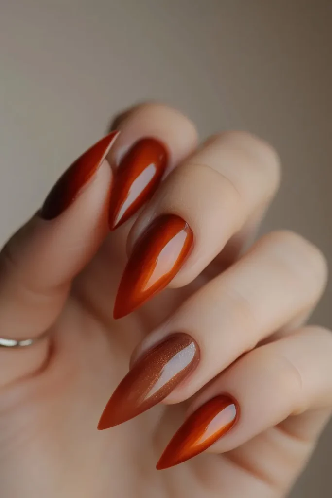 A burnt orange fall wedding nail look.