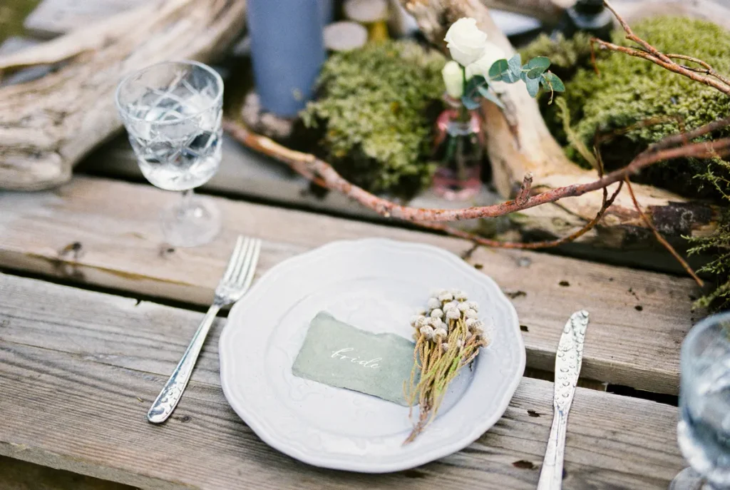A look at a way you could use twigs or branches in forest wedding table decor.