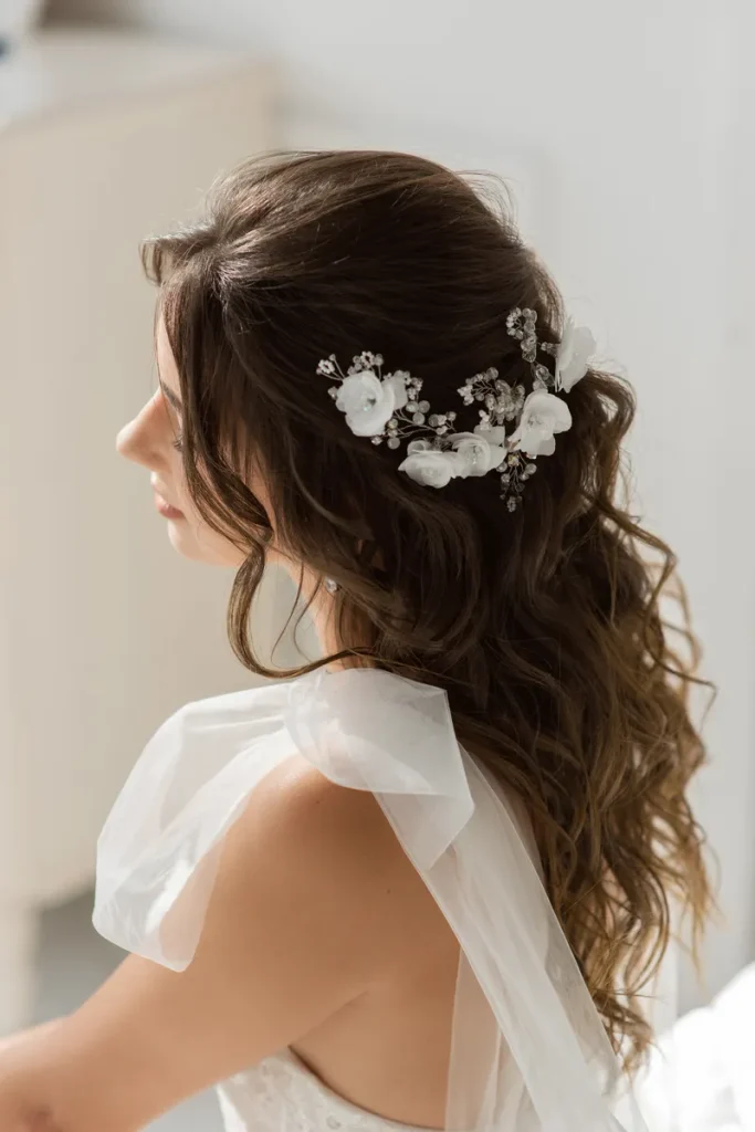 A beautiful floral comb to add to a bohemian wedding hair look.
