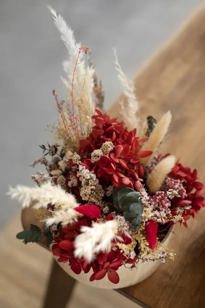 A dried flower fall wedding centerpiece.
